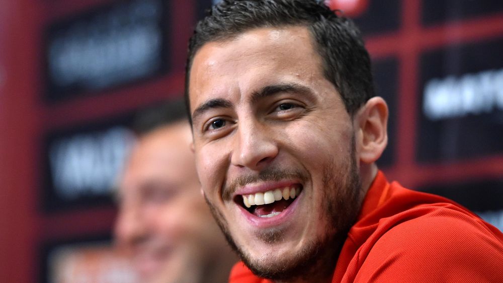 Belgium's national football team midfielder Eden Hazard smiles during a press conference