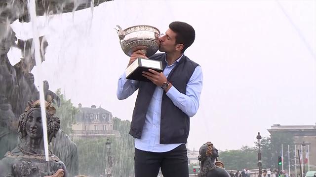 Djokovic poses with French Open trophy in Paris Djokovic poses with French Open trophy in Paris