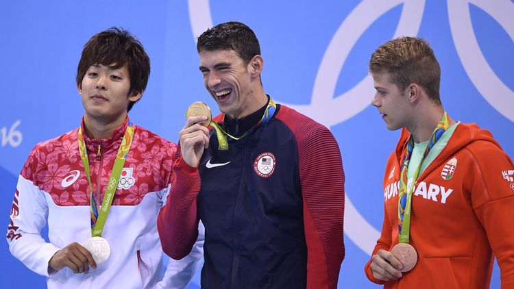 Masato Sakai (JPN) of Japan, Michael Phelps (USA) of USA and Tamas Kenderesi (HUN) of Hungary pose with their medals in Rio