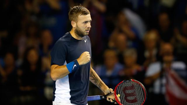 Pumped-up Evans edges Tomic for best Slam showing