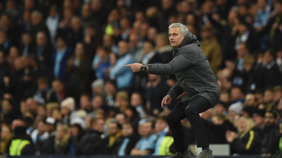 Manchester United's Portuguese manager Jose Mourinho gestures on the touchline during the English Premier League football match between Manchester City and Manchester United at the Etihad Stadium in Manchester