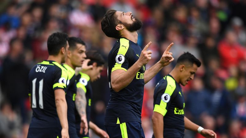 Olivier Giroud of Arsenal celebrates scoring his sides first goal during the Premier League match between Stoke City and Arsenal