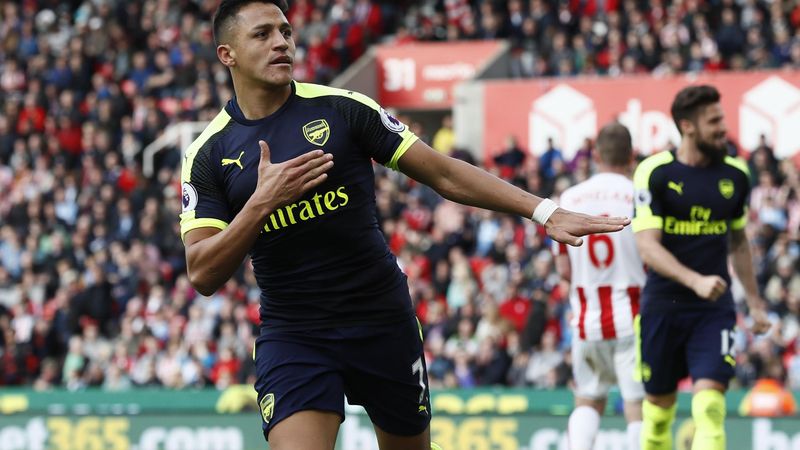 Arsenal's Alexis Sanchez celebrates scoring their third goal