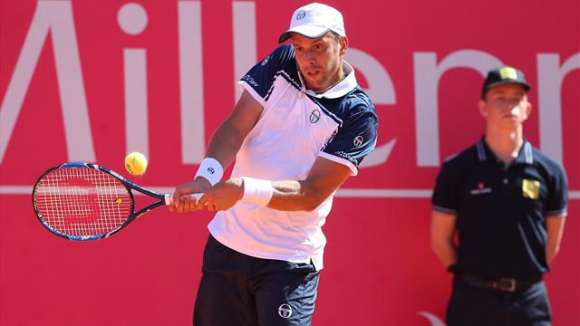 Karlovic serves 12,000th ace but Muller wins landmark battle