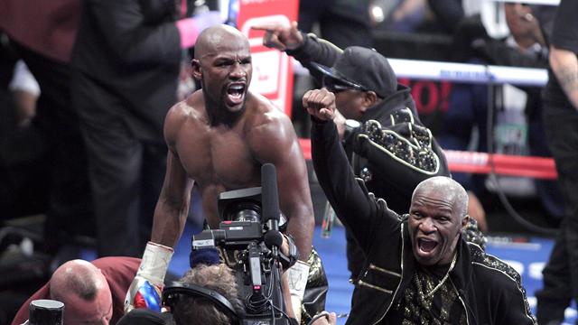 Mayweather rallies to earn TKO win over fading McGregor, confirms retirement