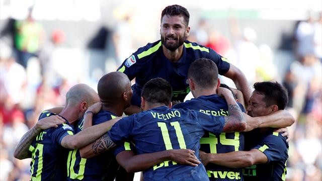 Inter score two late goals to maintain perfect start