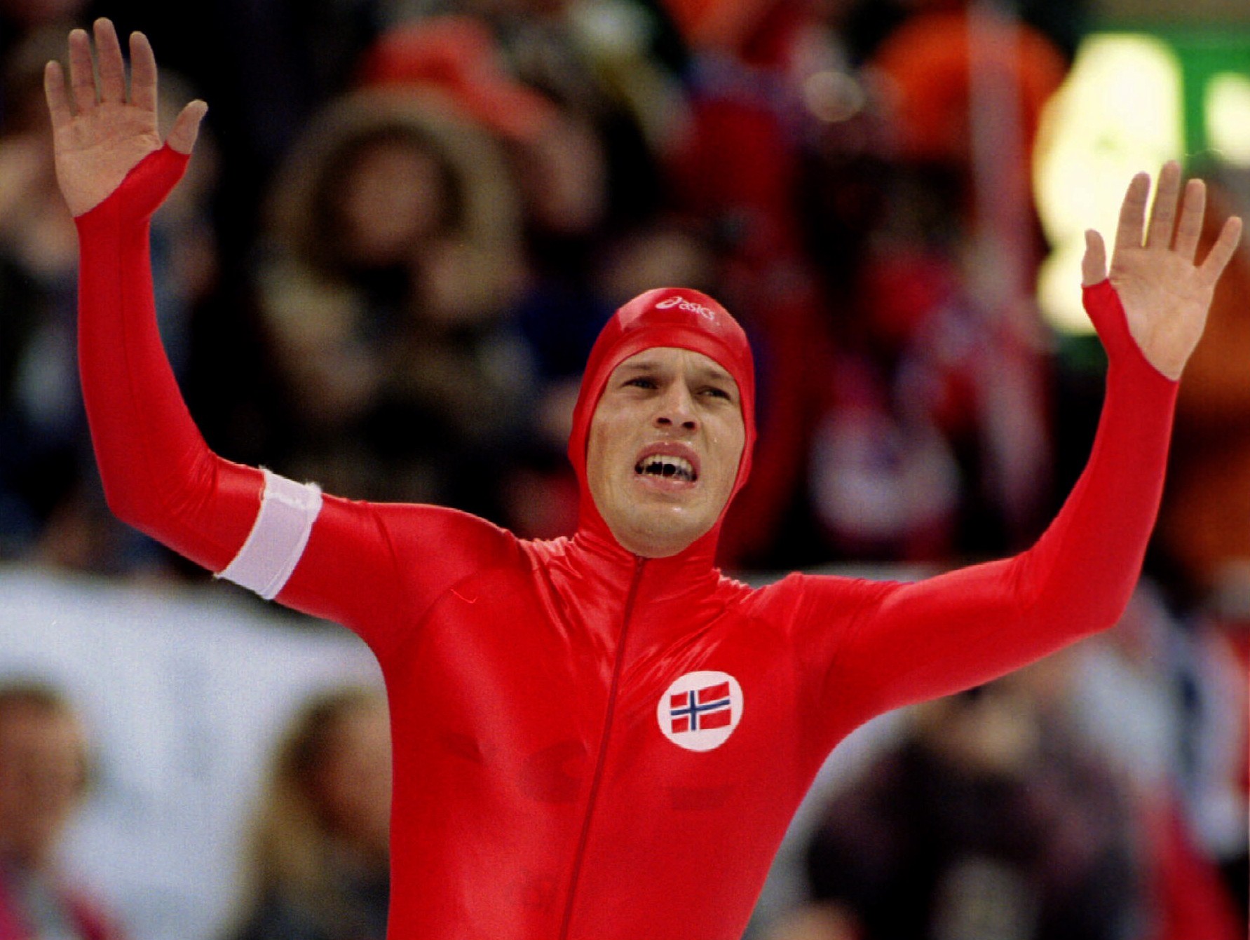 Johann Olav Koss of Norway celebrates as he wins the 10,000 metres speed skating event of the Lillehammer Olympics at Hamar's Olympic Hall 