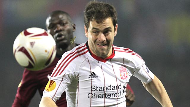 Liverpool claim turgid draw
