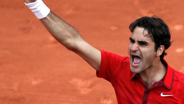 Federer snaps Djokovic winning streak