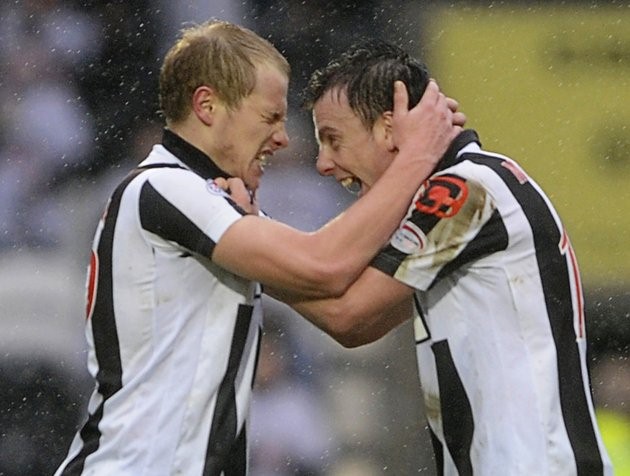 St Mirren's Aaron Mooy (L) celebrates his goal with Paul McGowan during their Scottish Premier League soccer match against Rangers at New St Mirren Park, Paisley