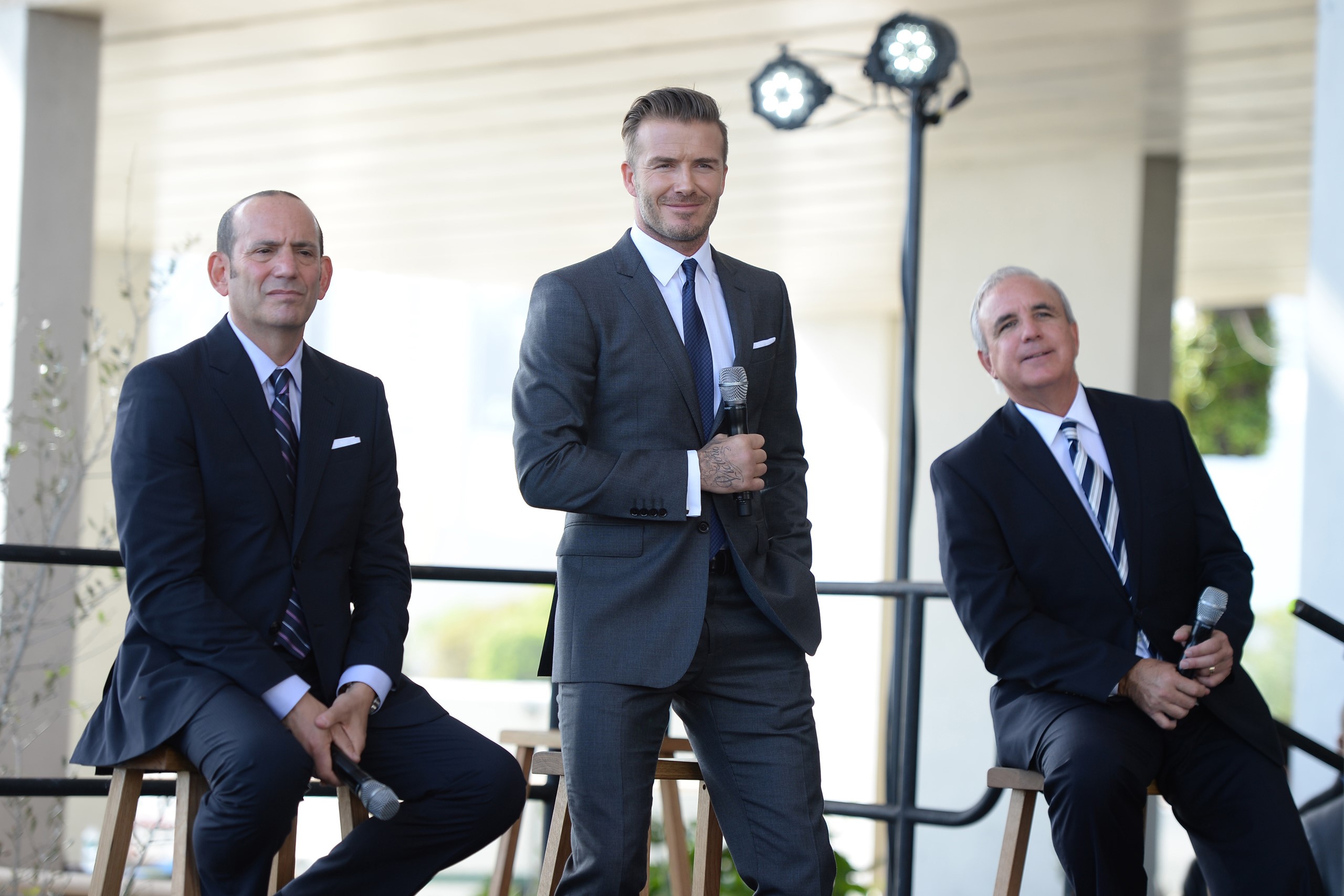 Commissioner Don Garber, David Beckham and Mayor Carlos Gimenez attend a press conference to announce their plans to launch a new MLS franchise in Miami (AFP)