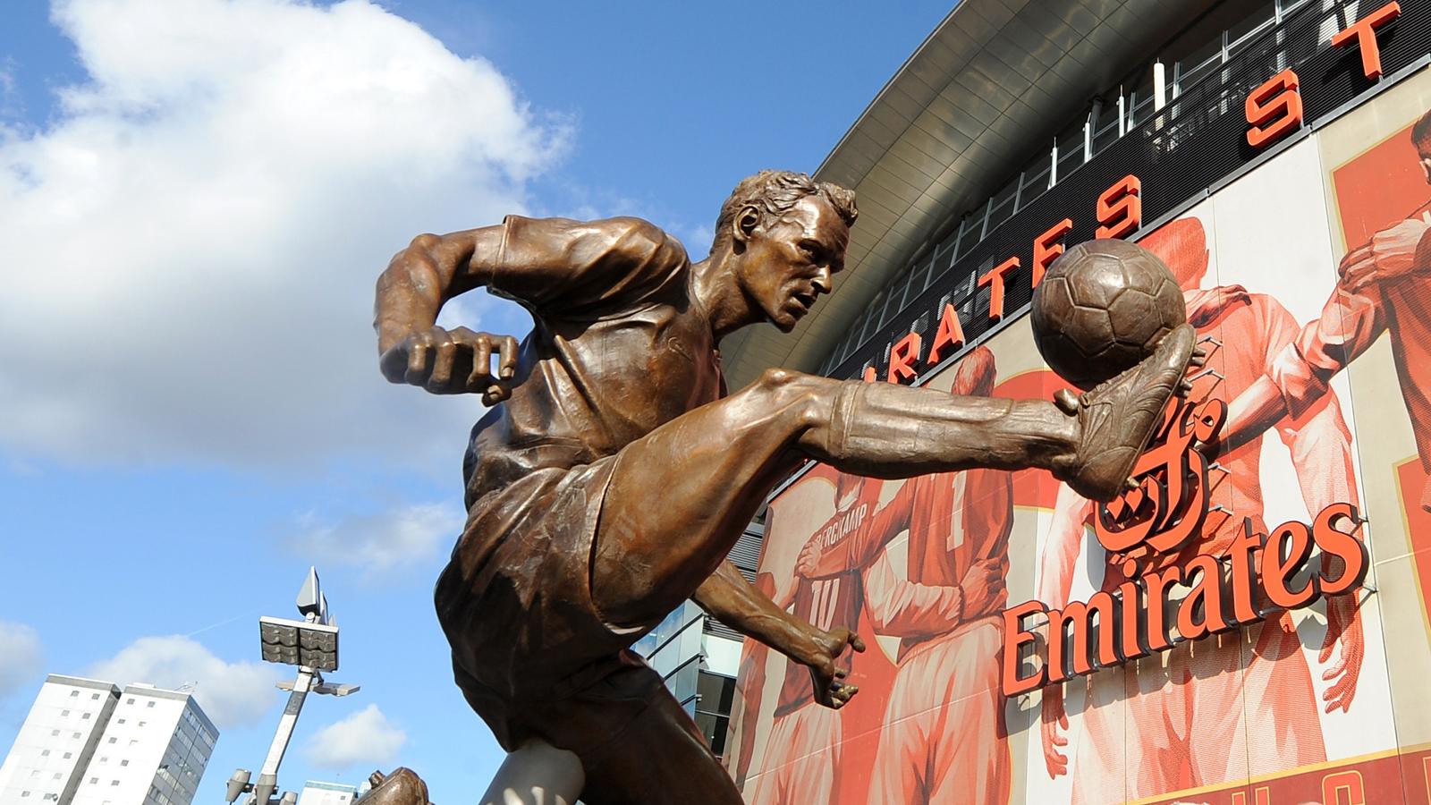 Arsenal honour Bergkamp with statue at stadium Premier League 2012