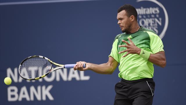 Tsonga battles past Murray to reach semis