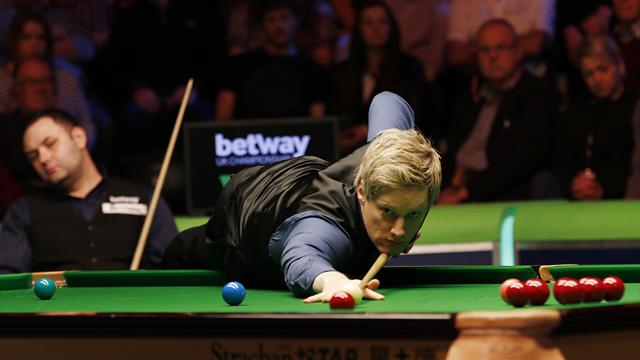 Robertson eases past Maguire, Higgins edges out Burnett