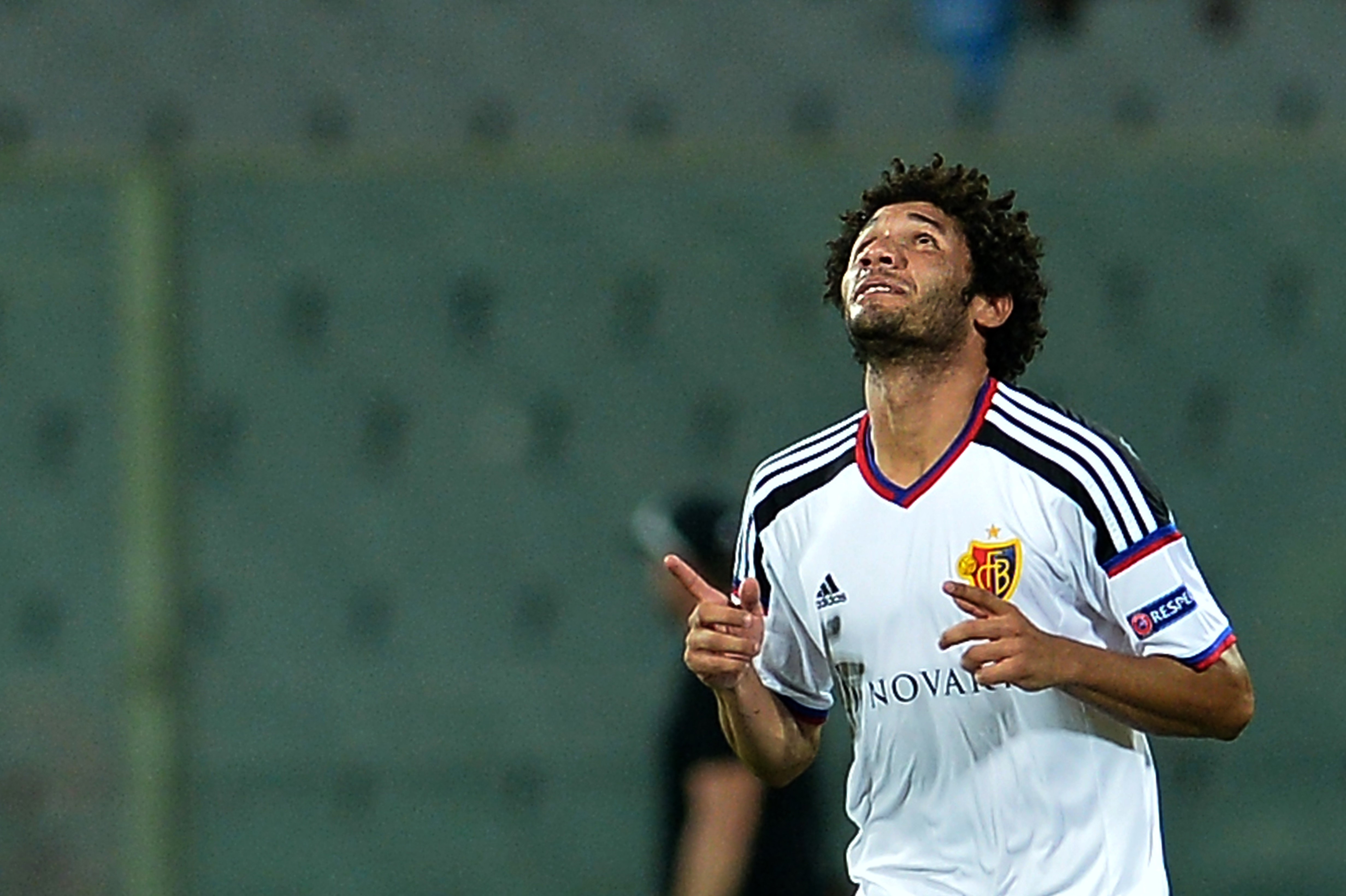 Basel's midfielder Mohamed Elneny celebrates after scoring during theEuropa League football match between Fiorentina and Basel