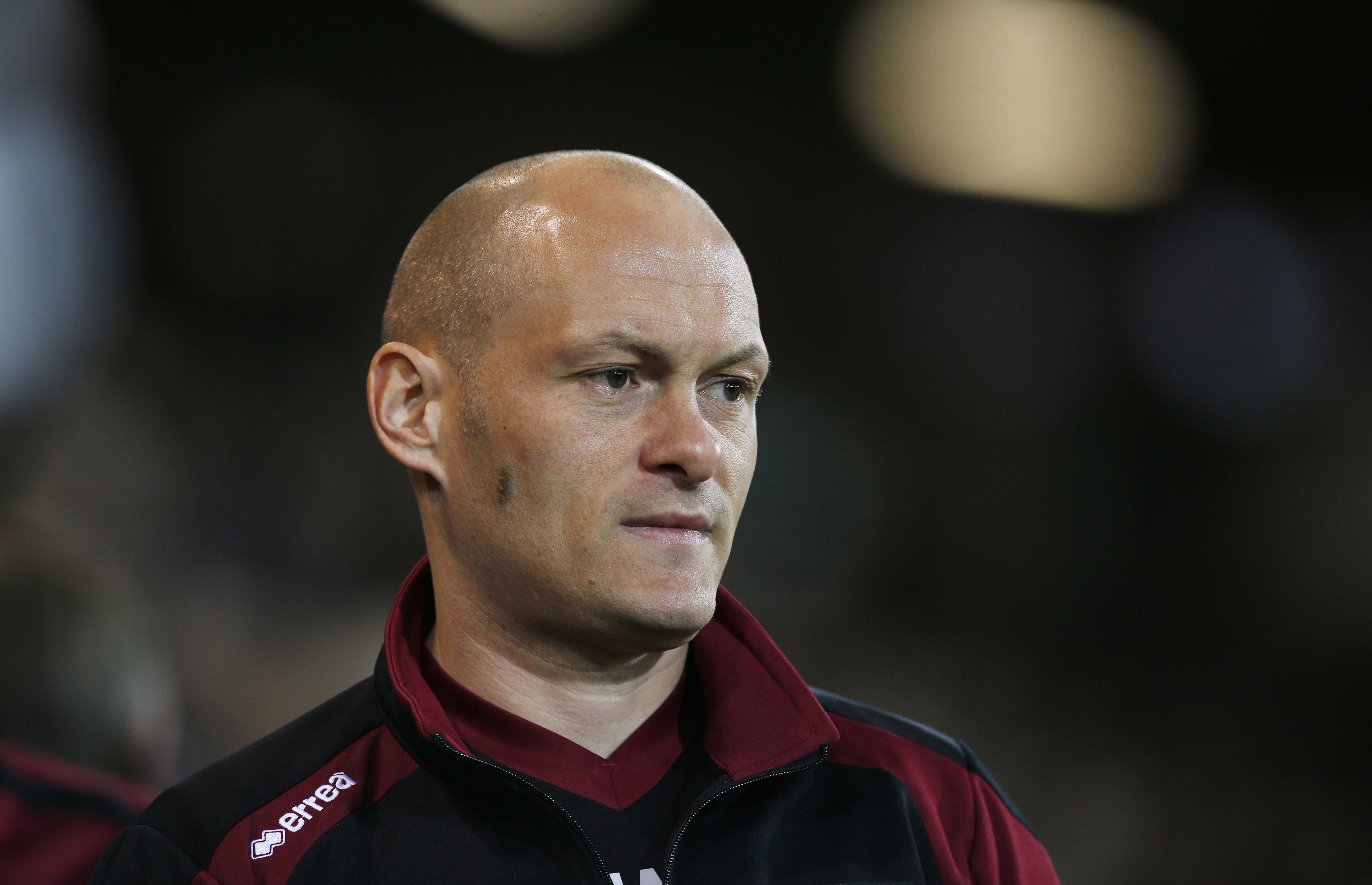 Norwich boss Alex Neil is left dejected after Chelsea loss