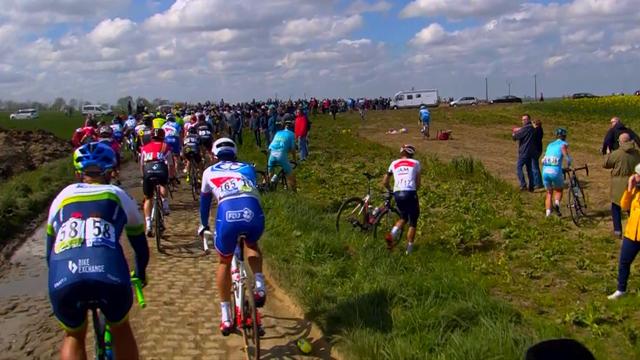 Chaos on the cobbles as riders leave road after crash Chaos on the cobbles as riders leave road after crash