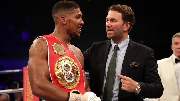 Eddie Hearn, right, is determined Anthony Joshua, left, will defend his title in Manchester on December 10