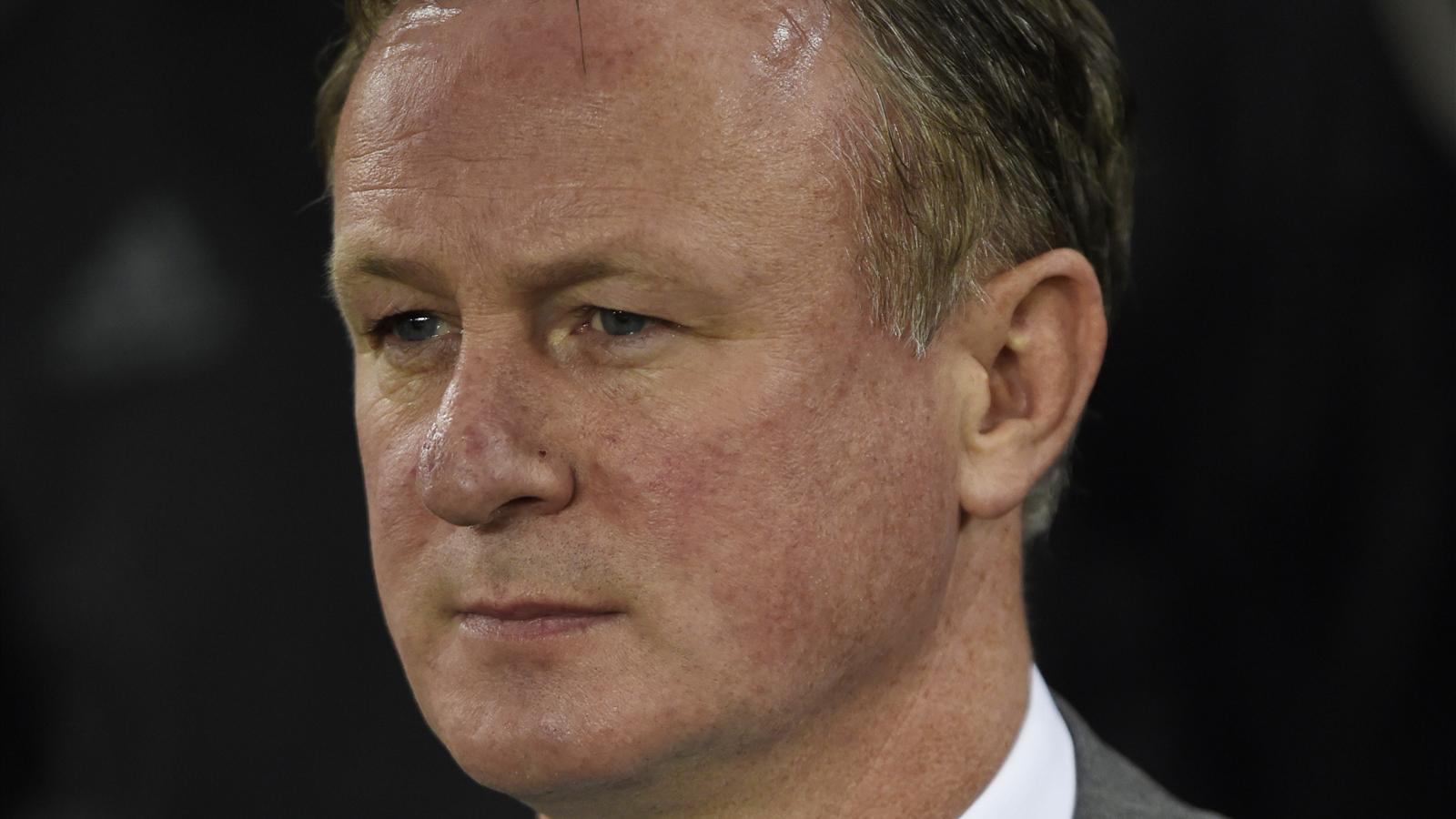 Northern Ireland boss Michael O'Neill held on suspicion of ...