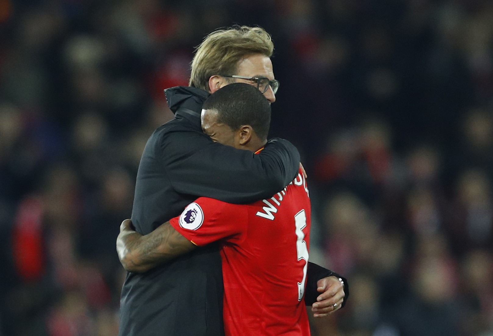 Liverpool manager Jurgen Klopp and Georginio Wijnaldum hug