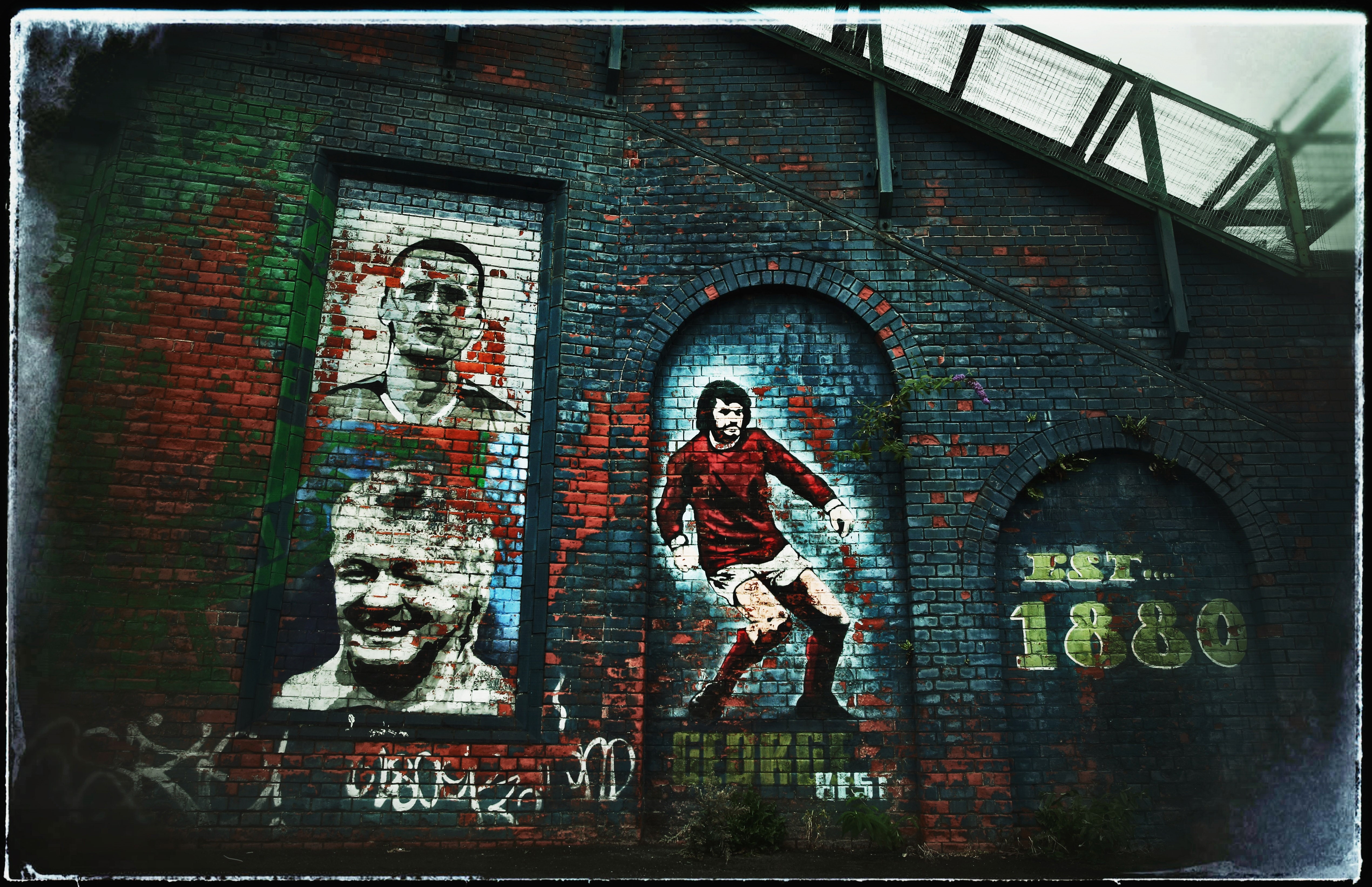 The George Best mural is seen outside Windsor Park prior to the FIFA 2014 World Cup Group F Qualifier match between Northern Ireland and Russia at Windsor Park on August 14, 2013 in Belfast, Northern Ireland.