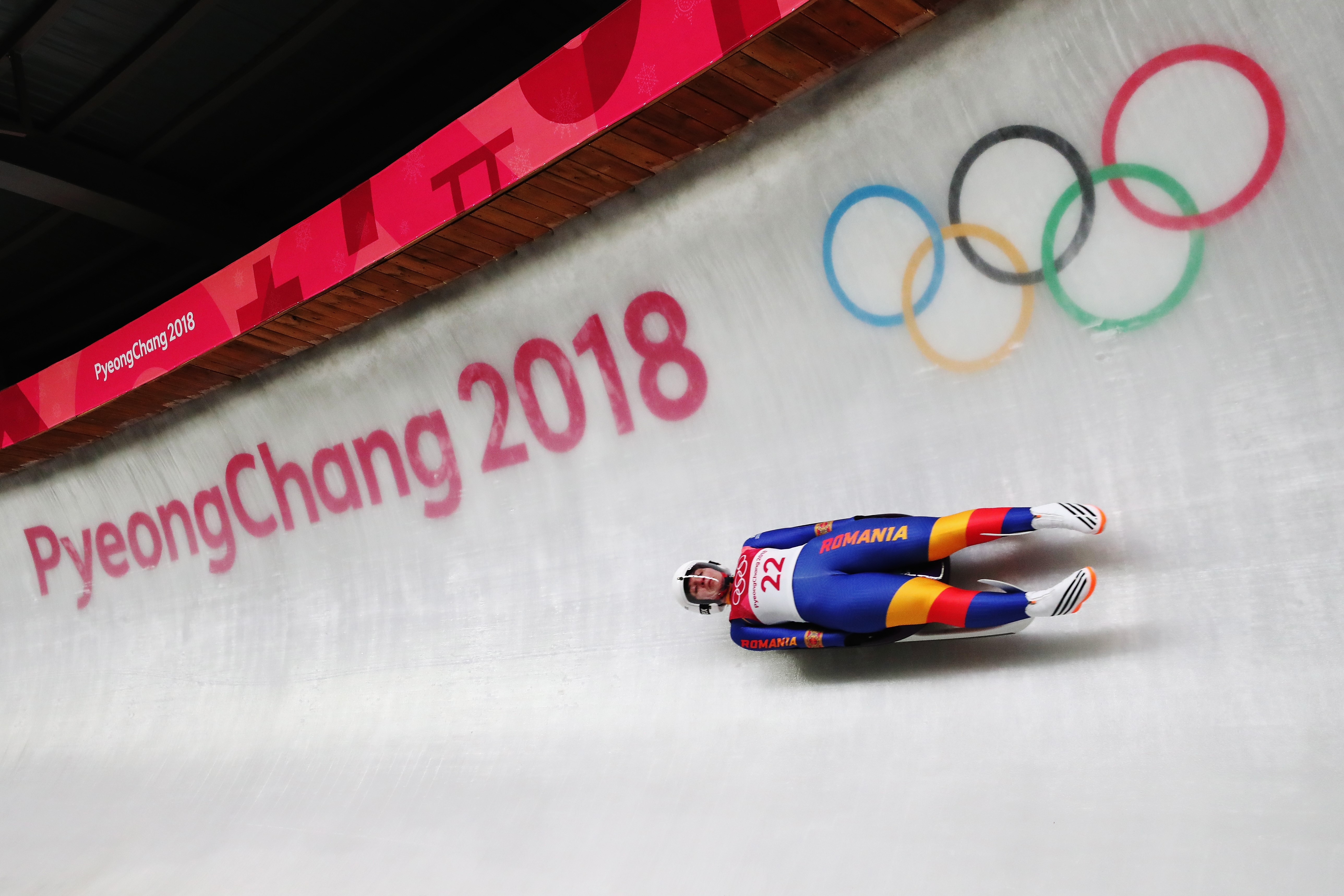 Raluca Stramaturaru of Romania slides during the Women's Singles Luge run 1 at Olympic