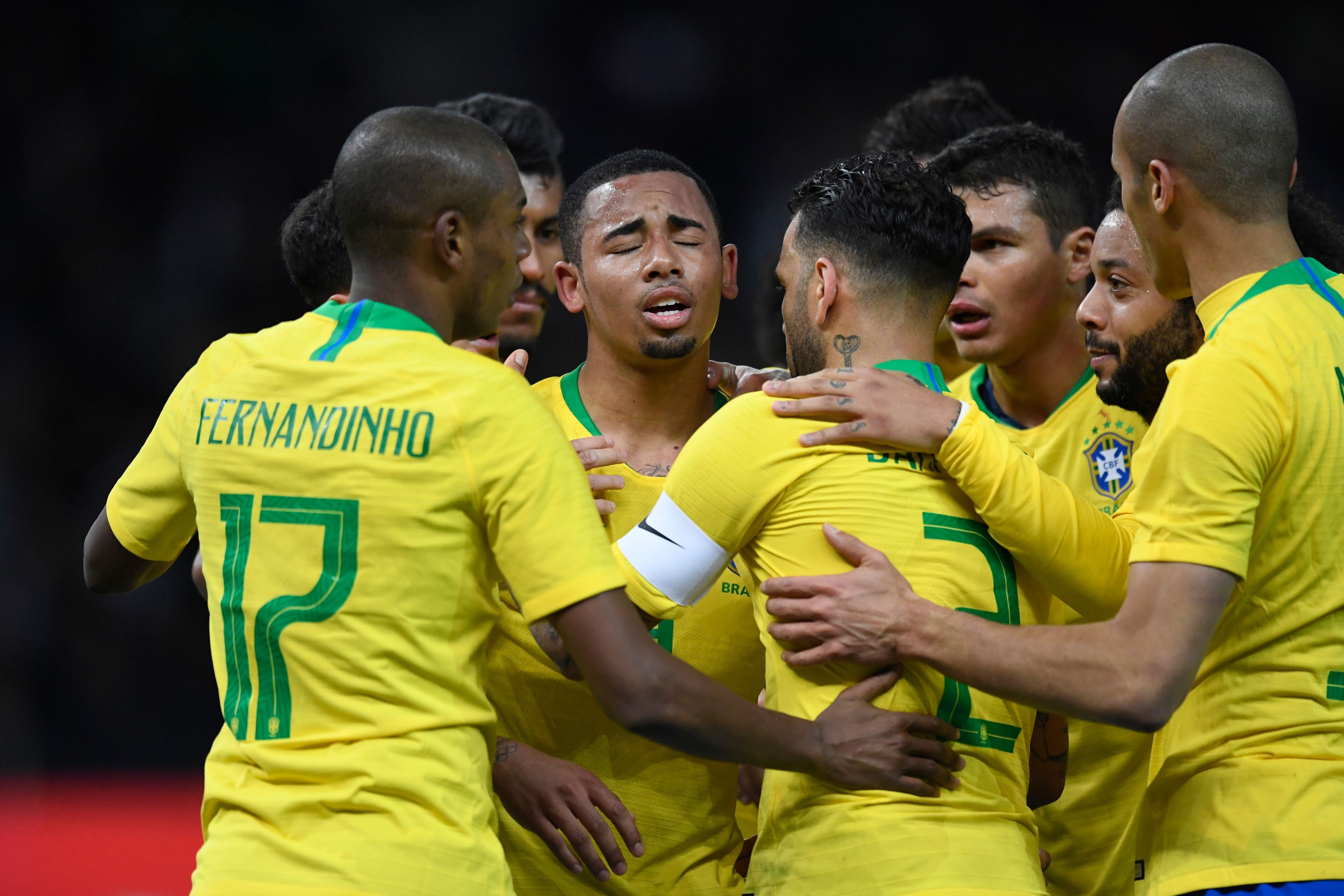 Brazil's team celebrates the goal scored by forward Gabriel Jesus (C)