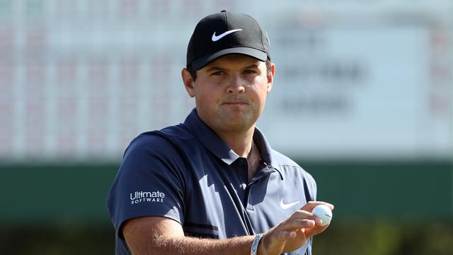 Reed storms into Masters lead, Tiger just makes cut