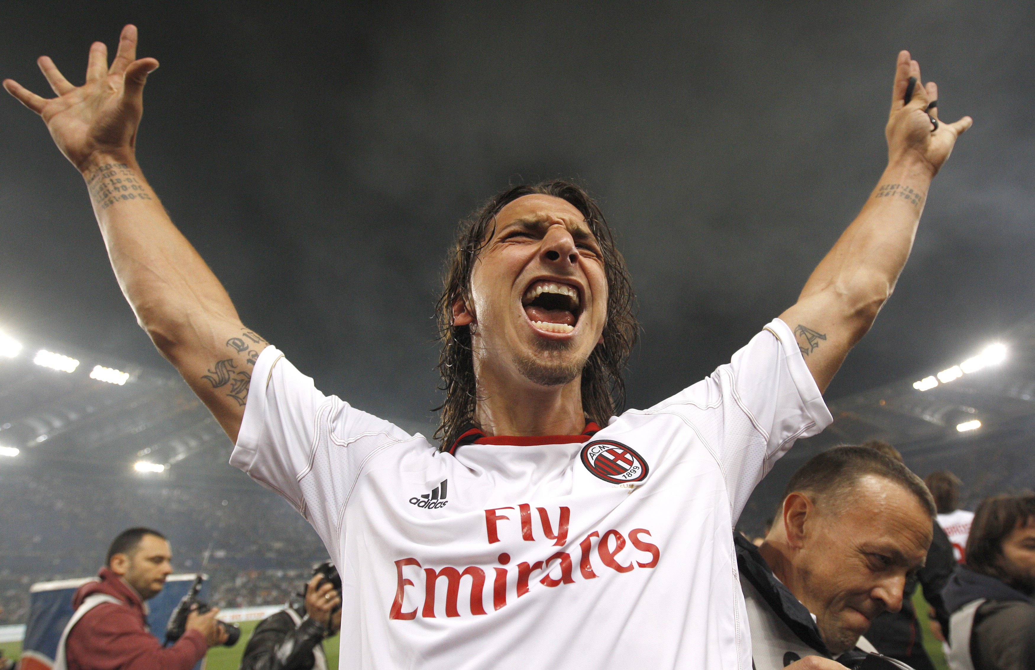 AC Milan's Zlatan Ibrahimovic celebrates after winning the Serie A title at the end of their match against AS Roma