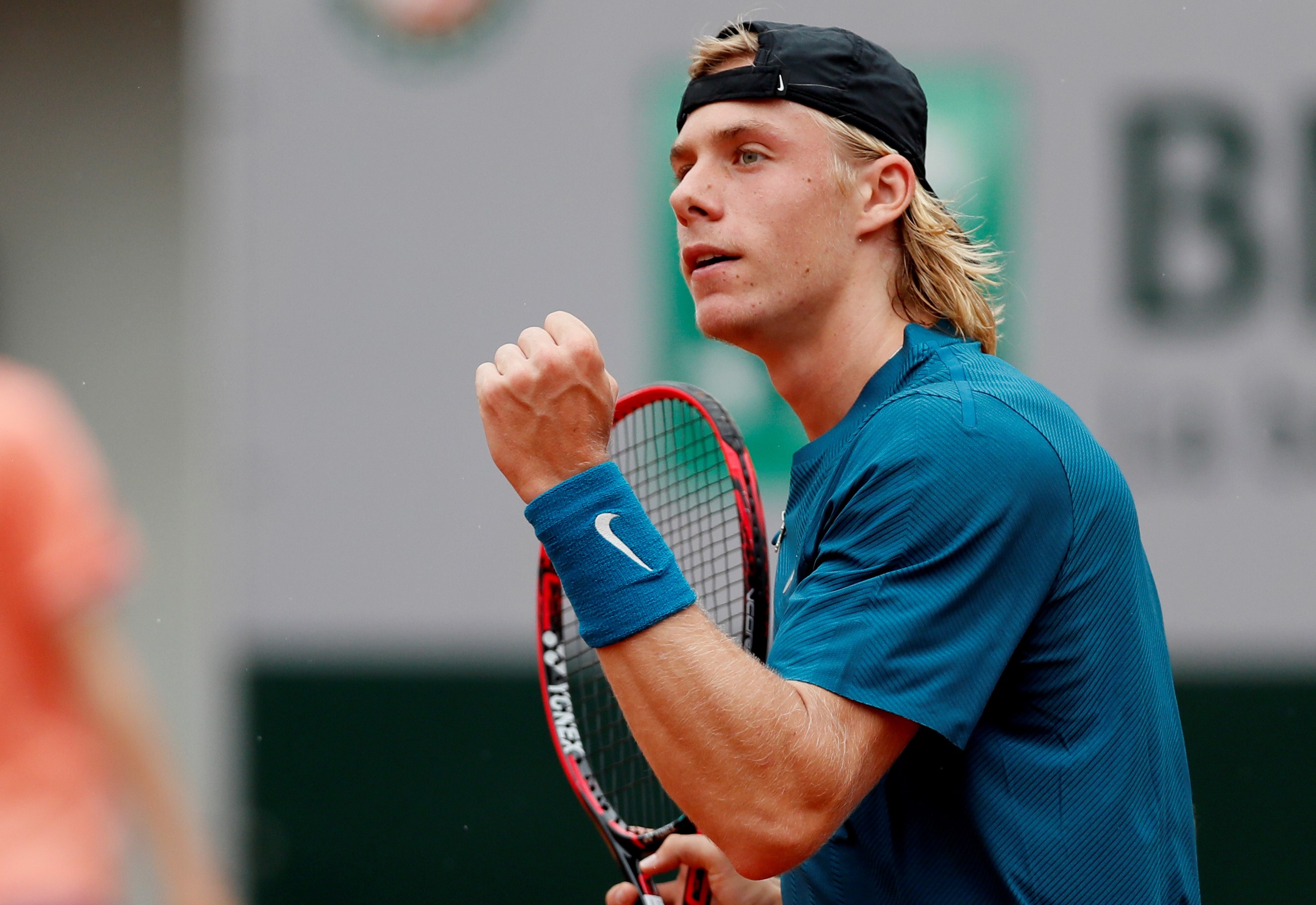 Canada's Denis Shapovalov celebrates during his first round match against Australia's John Millman