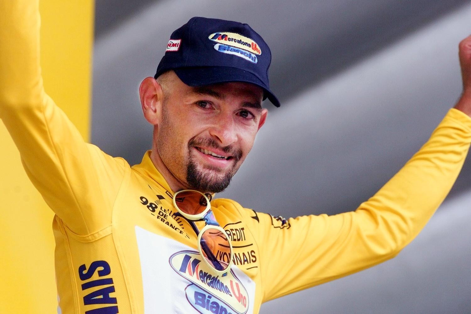 Marco Pantani on the podium of the 20th stage of the Tour de France in Le Creusot