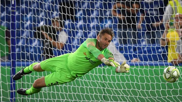 Green the hero as Chelsea beat Lyon on penalties