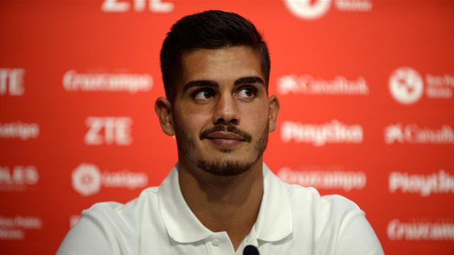 andre silva hits hat-trick for sevilla while huesca beat eibar