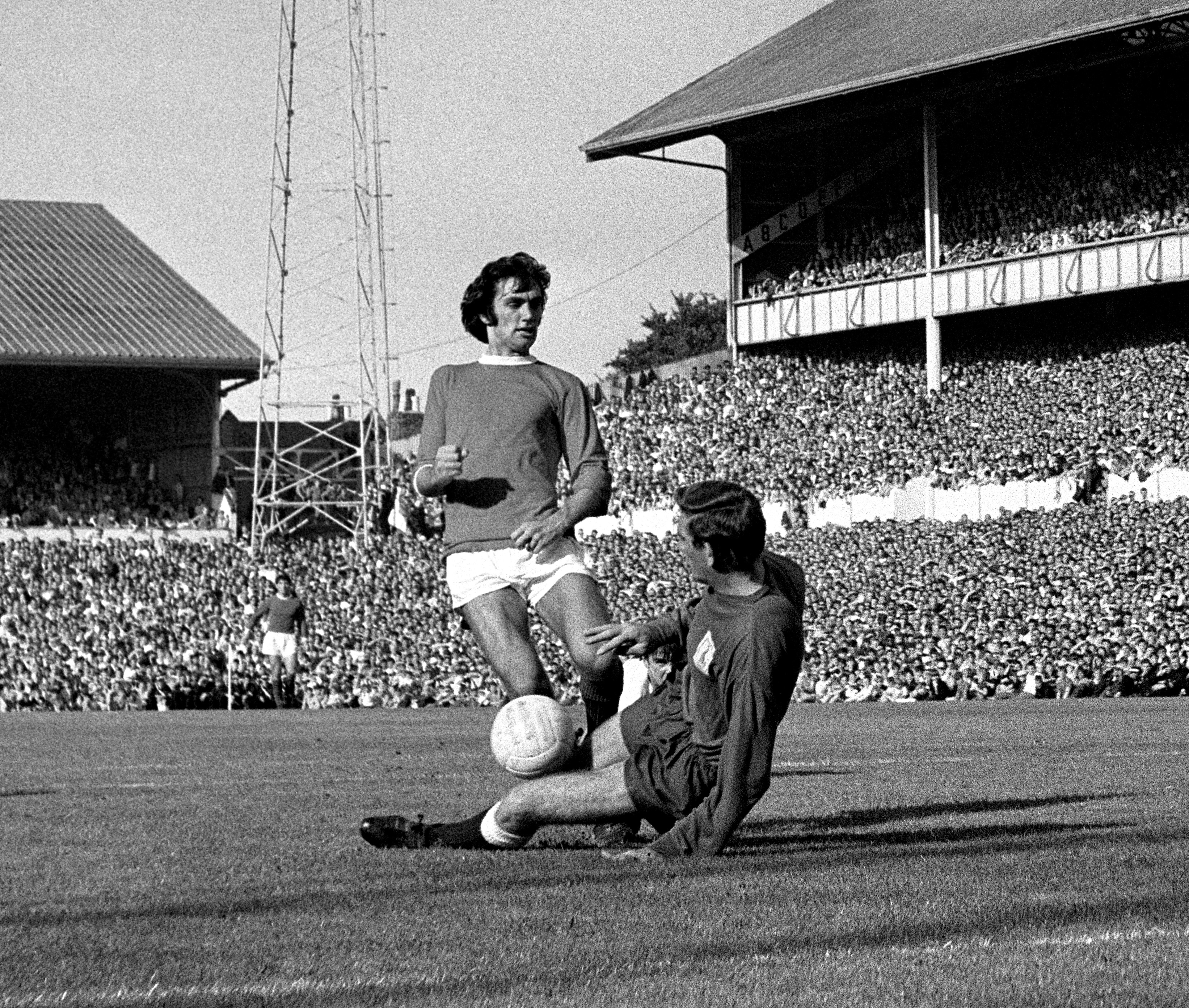 Manchester United star George Best (left) and Spurs goalkeeper Pat Jennings.