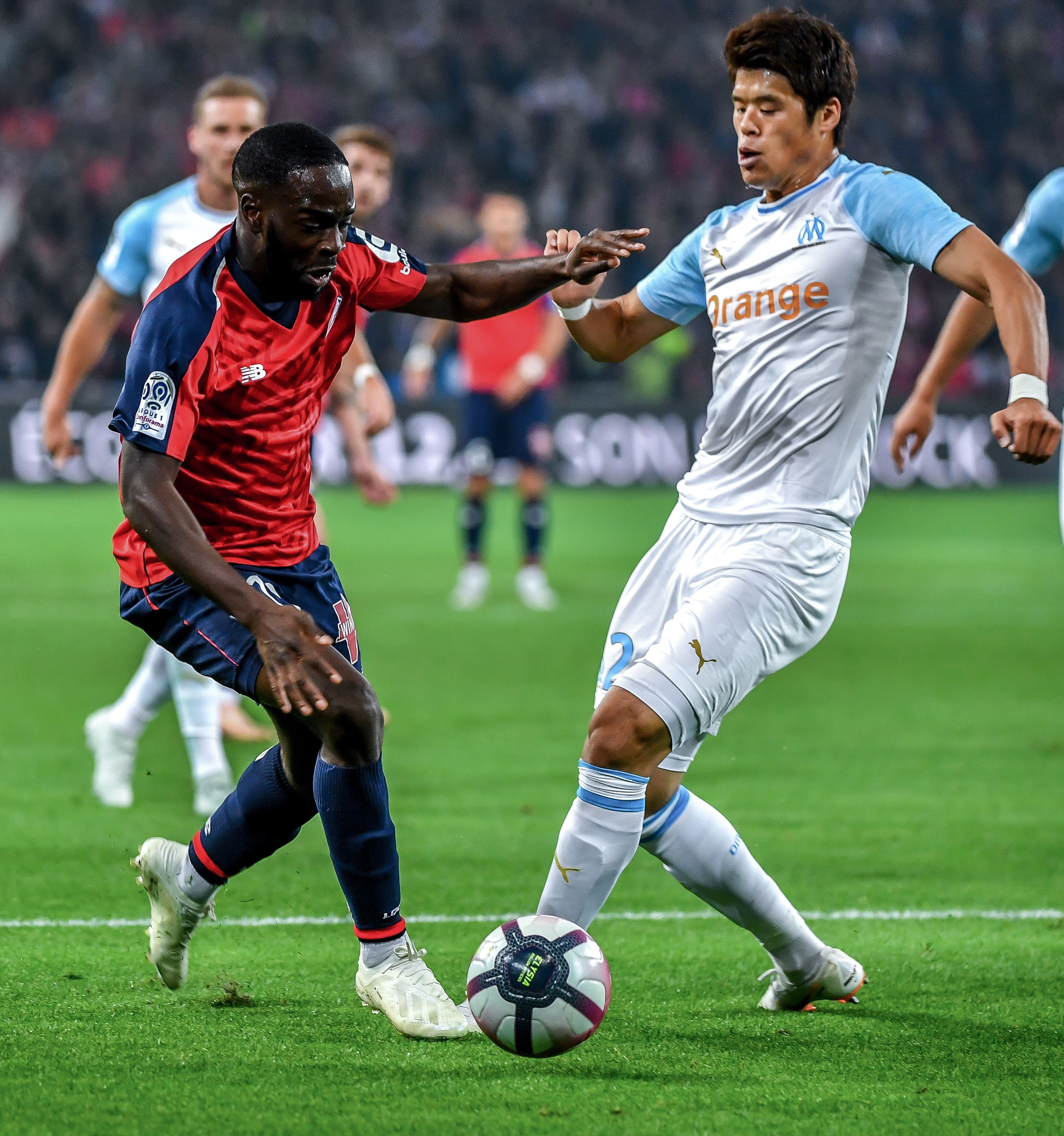 Jonathan Ikoné et Hiroki Sakai lors de Lille-OM / Ligue 1
