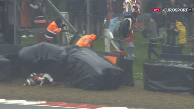 Dixon crashes out, stewards dodge bike as it flies into fence Dixon crashes out, stewards dodge bike as it flies into fence