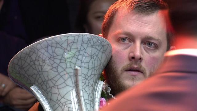 Allen receives giant trophy after winning International Championship Allen receives giant trophy after winning International Championship