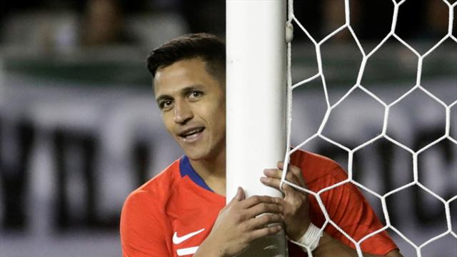 WATCH: Pitch-invading supporter slips celebrating Sanchez goal