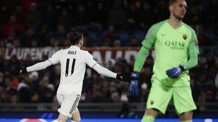 bale on target in win at roma that guarantees real top spot