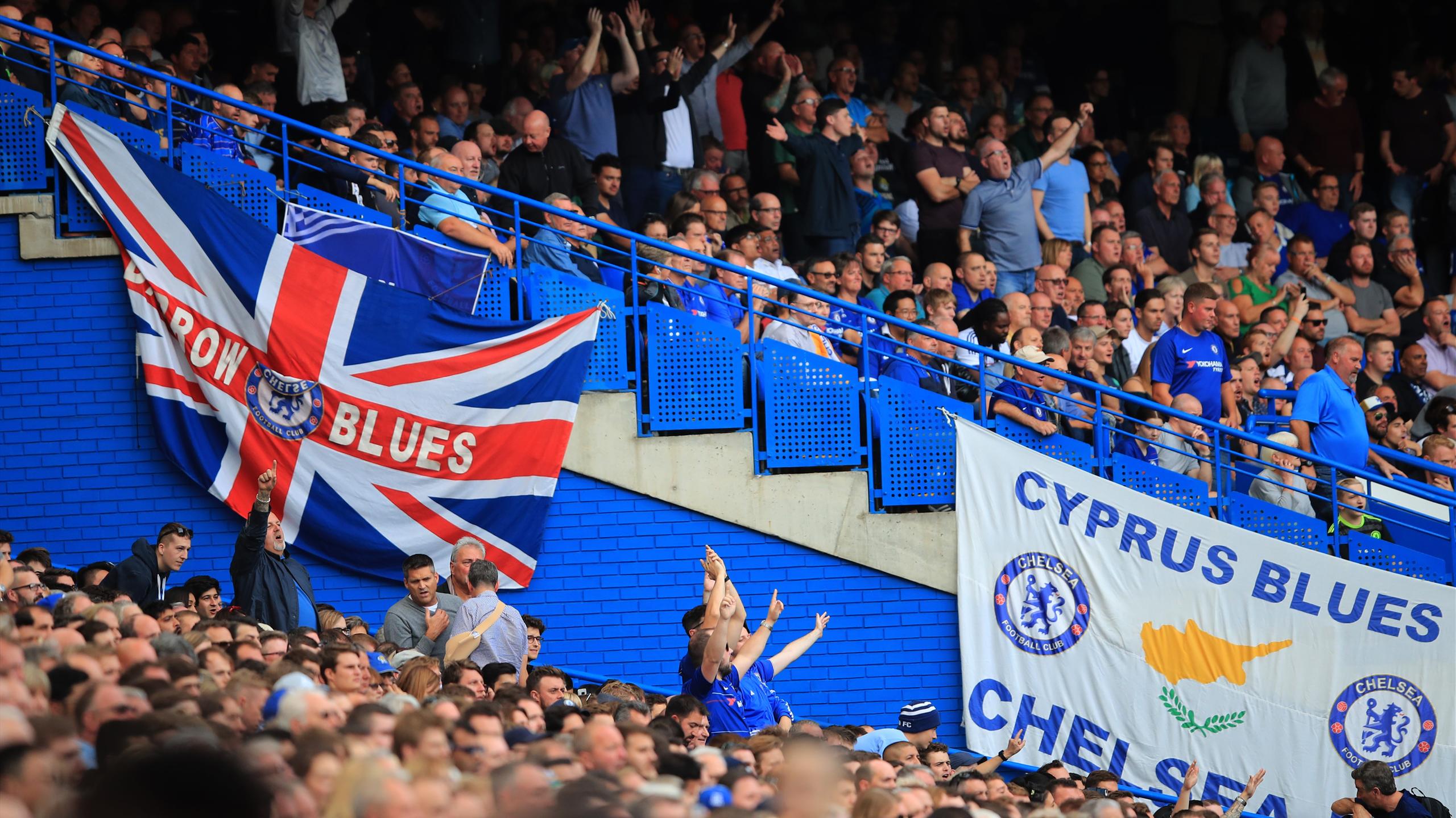 General view of Chelsea fans in front of a 'Cyprus Blues' banner