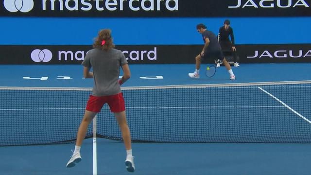 Federer attempts 'tweener' lob against Tsitsipas Federer attempts 'tweener' lob against Tsitsipas