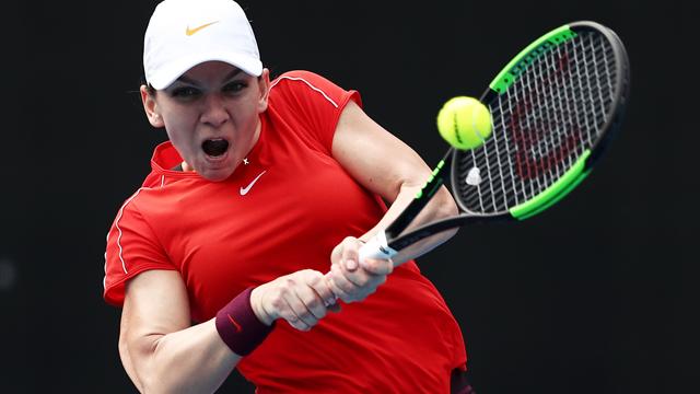 Coach-less Halep admits behind curve at Melbourne Park