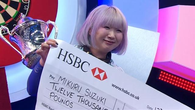 Mikuru Suzuki lifts the BDO trophy after flawless Lakeside performance Mikuru Suzuki lifts the BDO trophy after flawless Lakeside performance
