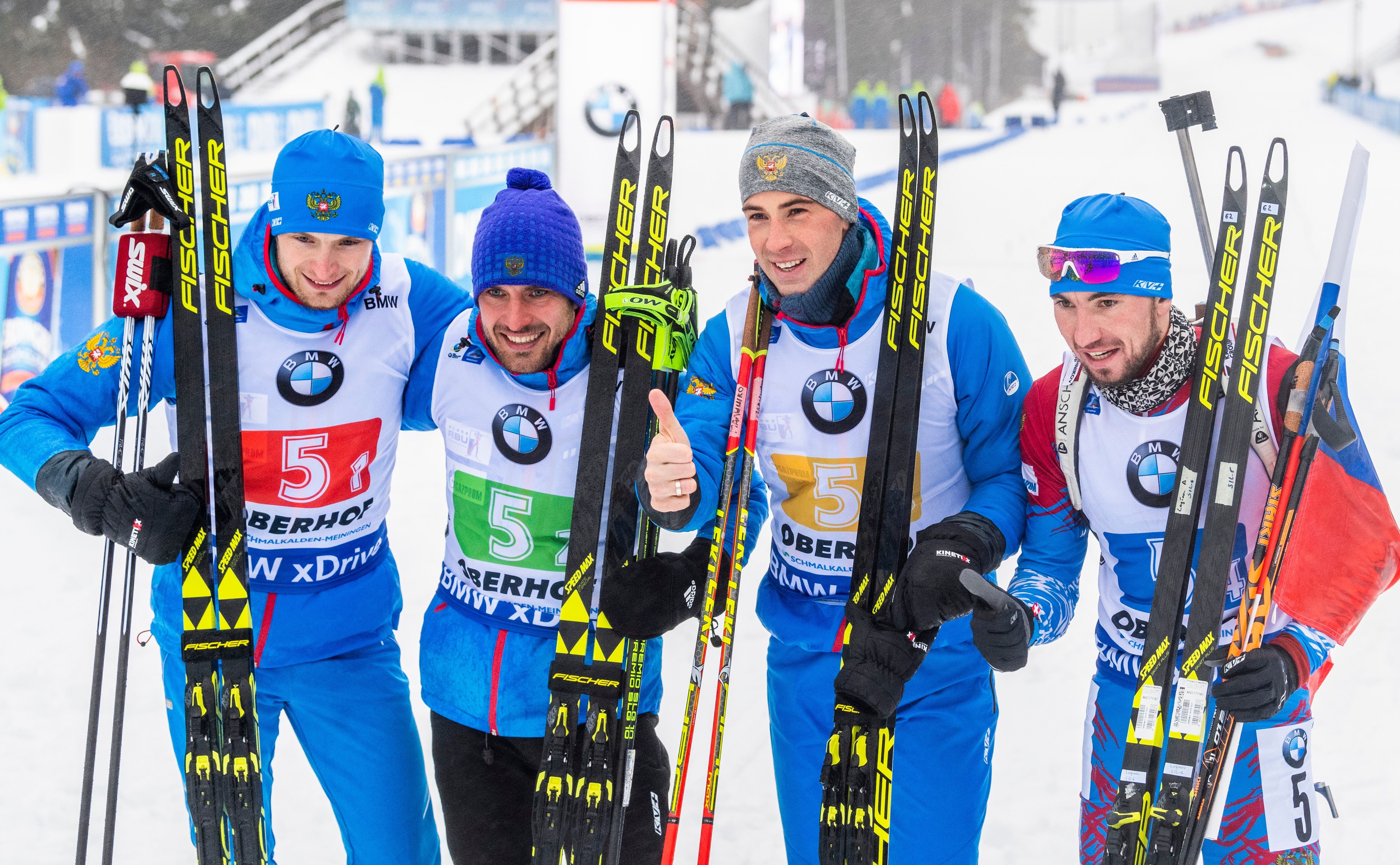 (L-R) Maxim Tsvetkov, Evgeniy Garanchiev, Dmitry Malyshko and Alexander Loginov of team Russia celebrate after winning the men's 4x7,5 km relay event of the IBU Biathlon World Cup in Oberhof, eastern Germany on January 13, 2019