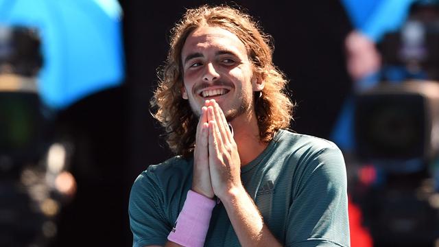 History-making Tsitsipas into semis after four-set win over battling Bautista Agut
