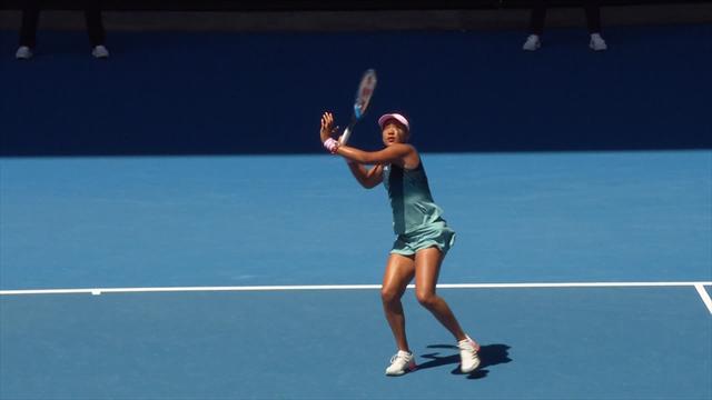 Osaka sends a wild forehand volley long Osaka sends a wild forehand volley long