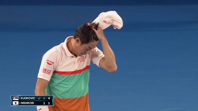 The moment Nishikori retired from his quarter-final against Djokovic The moment Nishikori retired from his quarter-final against Djokovic