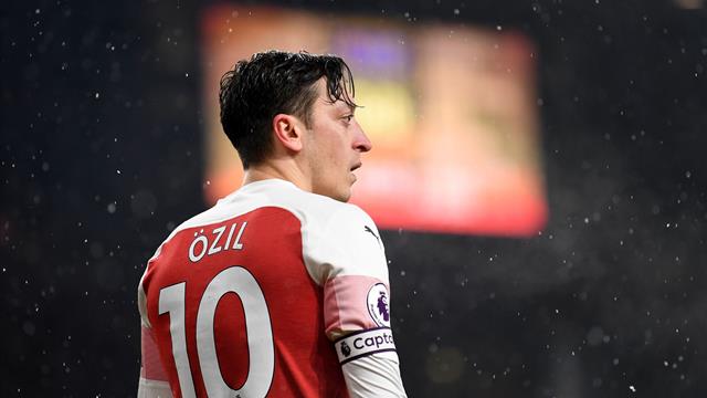 Ozil quotes Bergkamp in cryptic tweet to hint he will fight for Arsenal future