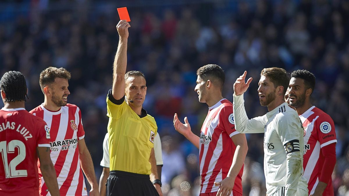 Sergio Ramos of Real Madrid is shown a red card by referee during the La Liga match between Real Madrid CF and Girona FC at Estadio Santiago Bernabeu on February 17, 2019 in Madrid, Spain.