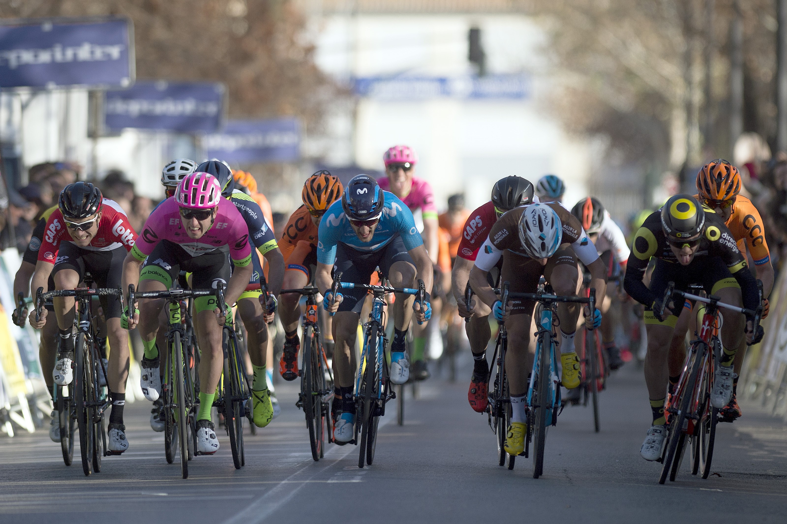 Direct Energie's French cyclist Thomas Boudat (2R) crosses the finish line winning the first stage of the 'Ruta del Sol' tour, a 197,6 km ride from Mijas to Granada on February 14, 2018